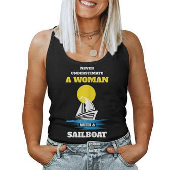 Never Underestimate A Woman With A Sailboat Women Tank Top - Seseable