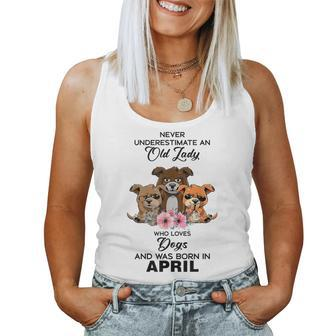 April Never Underestimate An Old Lady Who Loves Dogs Women Tank Top | Mazezy