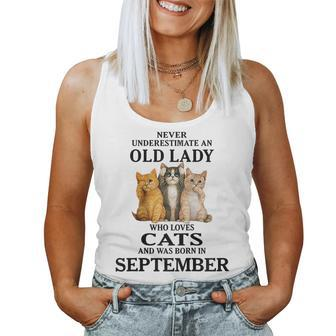 Never Underestimate An Old Lady Who Loves Cats September Gift For Womens Women Tank Top Basic Casual Daily Weekend Graphic - Seseable