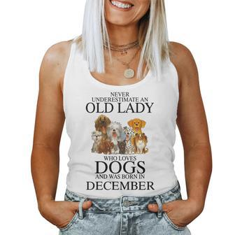 Never Underestimate An Old Lady Who Loves Dogs Born December Women Tank Top Basic Casual Daily Weekend Graphic - Seseable
