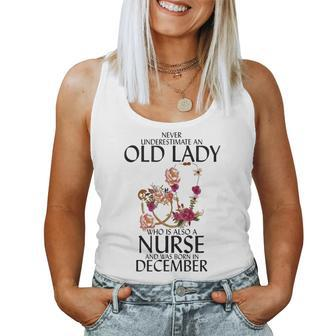 Never Underestimate An Old Lady Who Is Also A Nurse December Women Tank Top - Seseable