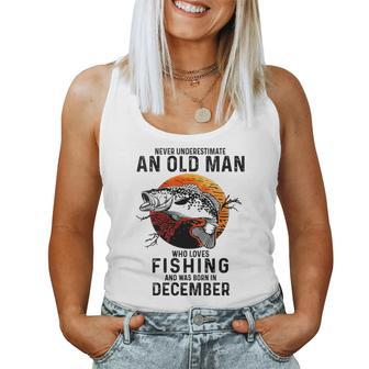 Never Underestimate An Old Man Loves Fishing December Women Tank Top - Thegiftio UK