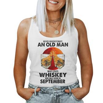 Never Underestimate An Old September Man Who Loves Whiskey Women Tank Top - Seseable