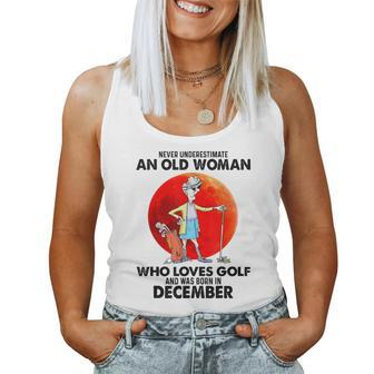 Never Underestimate An Old Woman Who Loves Golfs December Women Tank Top - Seseable