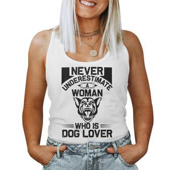 Never Underestimate A Woman Who Is A Dog Lover Dog Women Tank Top - Seseable