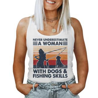 Never Underestimate A Woman With Dogs And Fishing Skills Women Tank Top - Monsterry CA