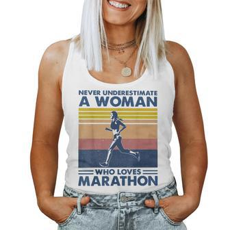 Never Underestimate A Woman Who Loves Marathon Women Tank Top | Mazezy