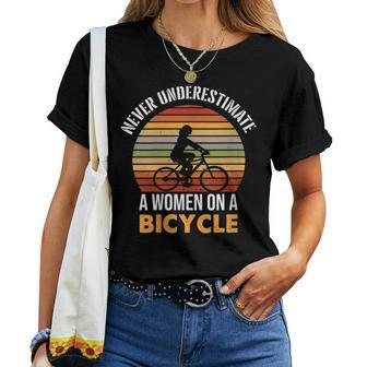 Bike Cyclist Never Underestimate A On A Bicycle Women T-shirt | Mazezy