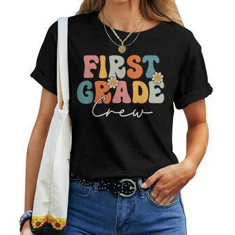 First Grade Crew Team Retro Groovy Vintage Back To School Women T-shirt