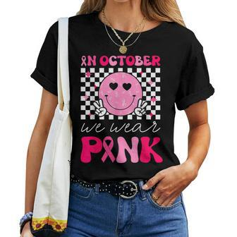 Groovy Breast Cancer Awareness In October We Wear Pink Women T-shirt - Seseable