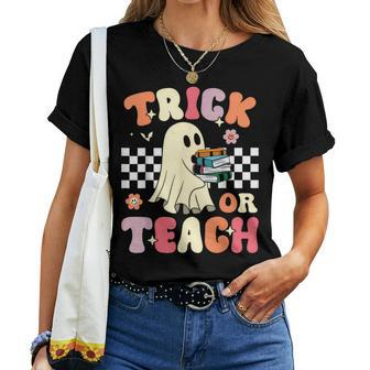 Groovy Teacher Halloween Trick Or Teach Retro Floral Ghost Women T-shirt - Thegiftio UK