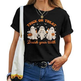 Groovy Trick Or Treat Brush Your Th Dental Halloween Women T-shirt - Monsterry