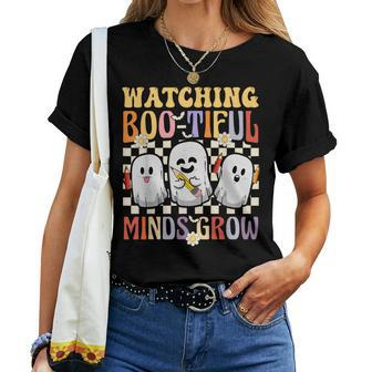 Halloween Teacher Retro Groovy Watching Boo-Tiful Minds Grow Women T-shirt | Mazezy