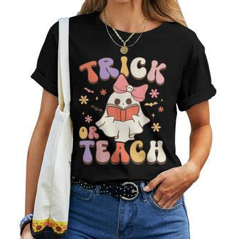 Halloween Teacher Trick Or Teach Groovy Floral Ghost Teacher Women T-shirt | Mazezy AU