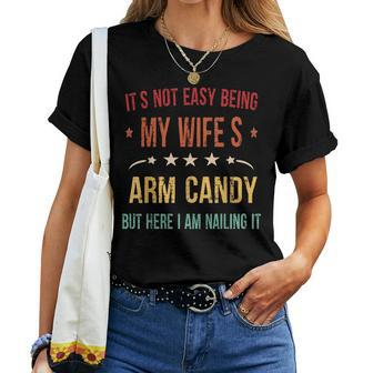 It's Not Easy Being My Wife's Arm Candy Here I Am Nailing It Women T-shirt | Mazezy