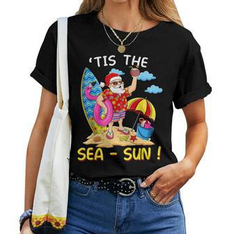 Santa Surf Flamingo Float Tis The Sea Sun Christmas In July Women T-shirt Crewneck Short Sleeve Graphic - Monsterry DE