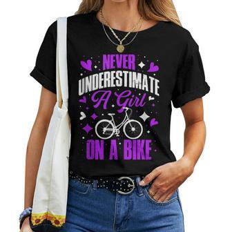 Never Underestimate A Girl On A Bike Women T-shirt | Mazezy