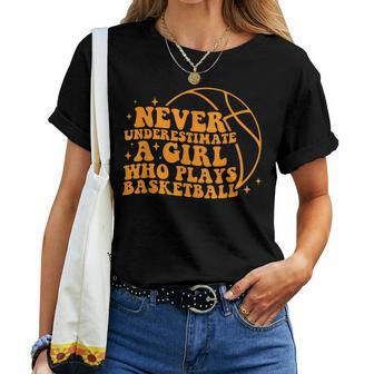 Never Underestimate A Girl Who Plays Basketball Groovy Women T-shirt | Mazezy
