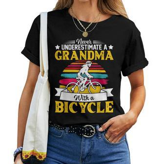 Never Underestimate A Grandma With A Bicycle Vintage Women T-shirt | Mazezy