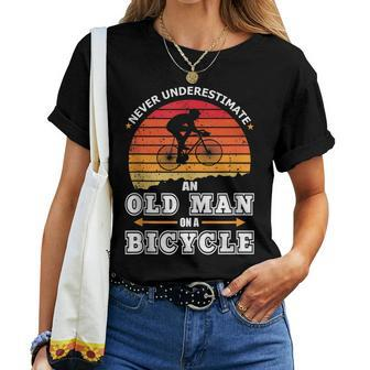 Never Underestimate An Old Man On A Bicycle Retired Cyclist Women T-shirt - Seseable