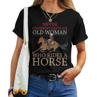 Never Underestimate An Old Woman Who Rides A Horse Cowgirl Women T-shirt - Seseable