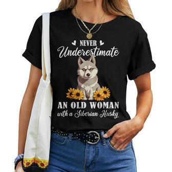 Never Underestimate An Old Woman With A Siberian Husky Lover Women T-shirt | Mazezy