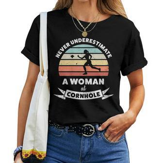 Never Underestimate A Woman At Cornhole Women T-shirt | Mazezy