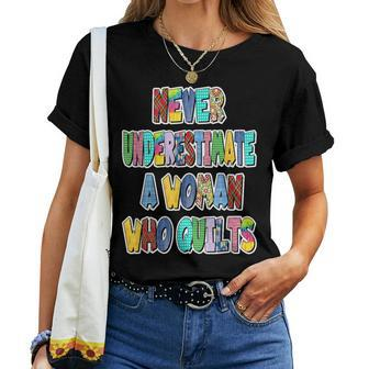 Never Underestimate A Woman Who Quilts Patchwork Letters Women T-shirt - Monsterry DE