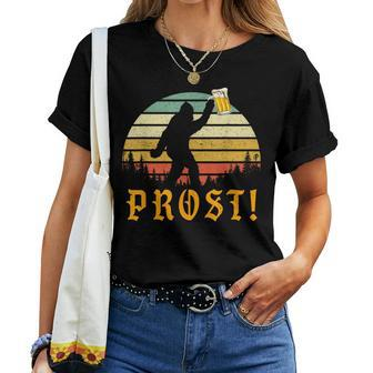 Vintage Prost Bigfoot Drinking Beer German Oktoberfest Women T-shirt | Mazezy