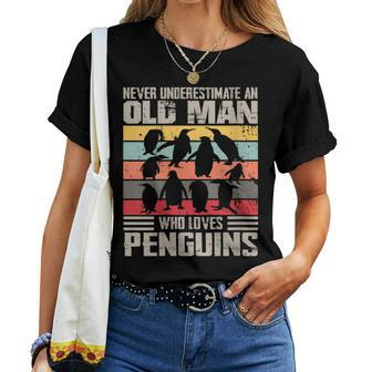 Vintage Never Underestimate An Old Man Who Loves Penguins Women T-shirt | Mazezy