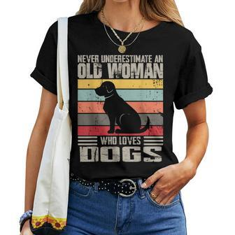 Vintage Never Underestimate An Old Woman Who Loves Dogs Cute Women T-shirt - Seseable