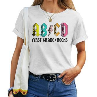Abcd First Grade Rocks Back To School 1St Grade Teacher Women T-shirt Short Sleeve Graphic - Monsterry