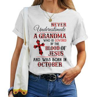 Covered By The Blood Of Jesus And Was Born In October Women T-shirt | Mazezy