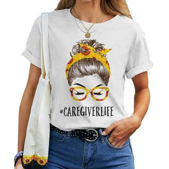 Messy Hair Bun Caregiver Sunflowers Headband Women T-shirt | Mazezy AU