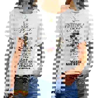 Never Underestimate An Old Lady Who Loves Dogs-November Women T-shirt | Mazezy