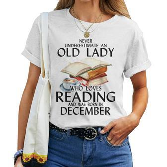 Never Underestimate An Old Lady Who Loves Reading December Women T-shirt | Mazezy