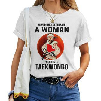 Never Underestimate A Woman Who Loves Taekwondo Women T-shirt | Mazezy