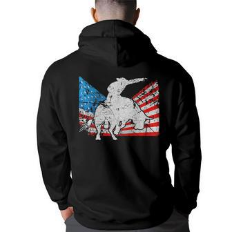 Distressed Bull Riding American Flag Rodeo Usa Rodeo Funny Gifts Back Print Hoodie | Mazezy
