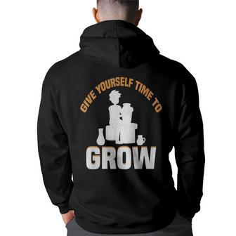 Give Yourself Time To Grow Strong Message Back Print Hoodie | Mazezy