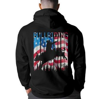 Vintage American Flag Rodeo Bull Riding Paint Drip Rodeo Funny Gifts Back Print Hoodie | Mazezy