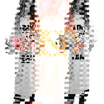 Groovy Halloween Trick Or Teach Retro Floral Ghost Teacher Women's Oversized Comfort T-shirt | Mazezy