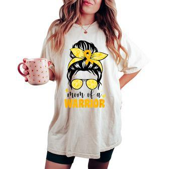 Mom Of A Warrior Childhood Cancer Messy Bun Gold Ribbon Mama Women's Oversized Comfort T-shirt | Mazezy