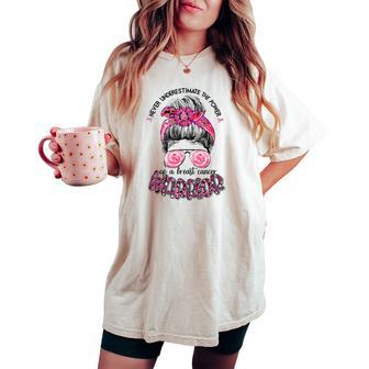 Never Underestimate Breast Cancer Warrior Messy Bun Ribbon Women's Oversized Comfort T-shirt - Seseable