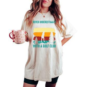 Never Underestimate A Girl With A Golf Club Women's Oversized Comfort T-shirt | Mazezy