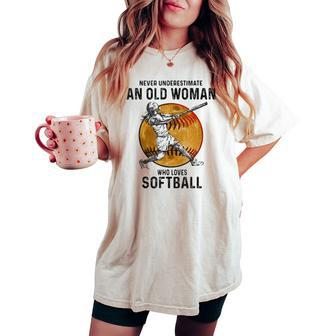 Never Underestimate An Old Woman Who Loves Softball Vintage Women's Oversized Comfort T-shirt - Seseable