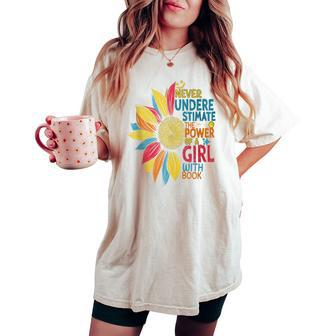 Never Underestimate The Power Of A Girl With Book Colorful Women's Oversized Comfort T-shirt - Monsterry UK