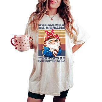 Never Underestimate A Woman With Cats And Hair Cutting Women's Oversized Comfort T-shirt - Monsterry DE
