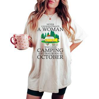 Never Underestimate A Woman Who Loves Camping Born October Women's Oversized Comfort T-shirt | Mazezy