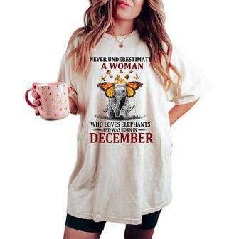 Never Underestimate A Woman Who Loves Elephants December Women's Oversized Comfort T-shirt - Thegiftio UK
