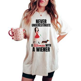 Never Underestimate A Woman With A Wiener Dachshund Women's Oversized Comfort T-shirt - Seseable
